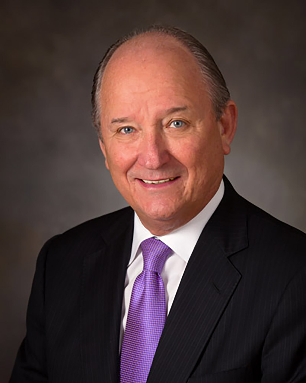 J. Michael Mullis | President & CEO
